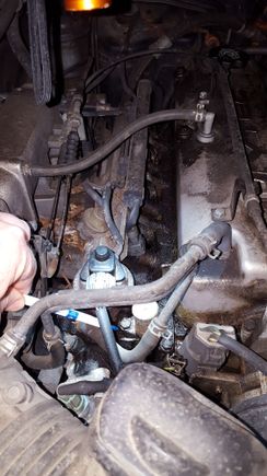 Oil leaking from below this bolt