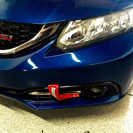 Finished product . End of loop secured with loose zip tie to prevent strap from dragging or flapping when not in use.