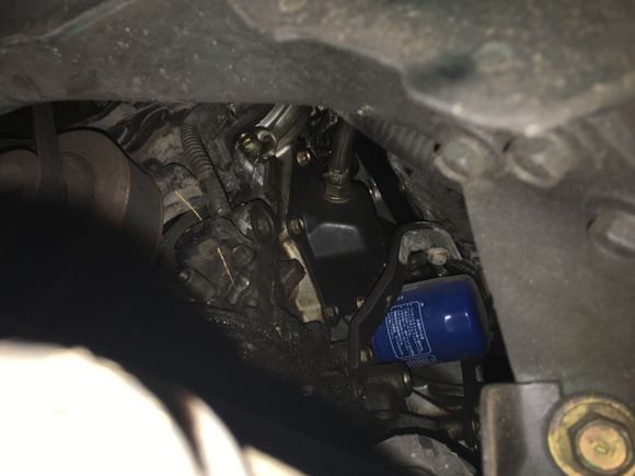 The water is coming out of a small hole above the bolt.