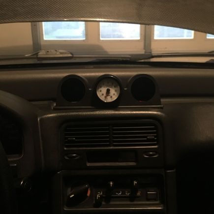 Started remounting my gauges.  Didn't get too far since the wiring was a mess.  Unfortunately I'll have to extend two of the harnesses to reach up to here.