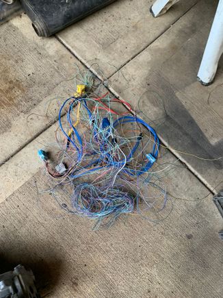 Most of the thinned out interior harness. Not pictured the dc converter wiring which about the same gauge as a thicker alternator charging wire. Happy it’s out and everything still works lol. I have to reloom the harness before I put the sound deadening in then carpet. Still have a bit of the firewall juke I need to get out behind the heater core. Also got the blower motor to work as it wasn’t before but I’m definitely gonna pull all interior grounds and coat them with dielectric grease. 