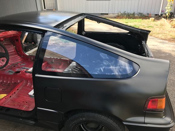 Started on doing the lexan. It's held on with heavy duty Velcro from Home Depot. Inside edges sprayed satin black to match. Really happy how this quarter panel glass turned out. 