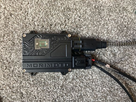 Bottom connection is the relay harness plugging into the ballast.