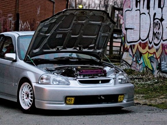 htup 0808 14 z 1996 honda civic coupe ej front quarter view stock hood