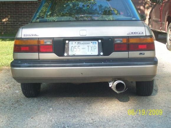 my car from the back (new 5.5 in. muffler with 4.5in. tip that i put on)