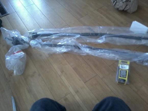 New shift linkage still wrapped, with energy suspension bushings