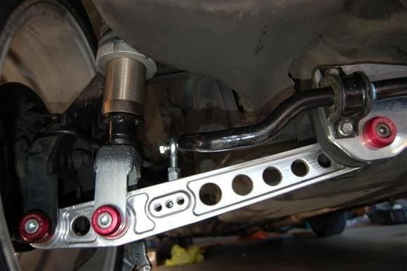 Also in this picture; Password:JDM teflon lined spherical endlinks. Longer subframe bolts to be able to fit through brace and subframe.