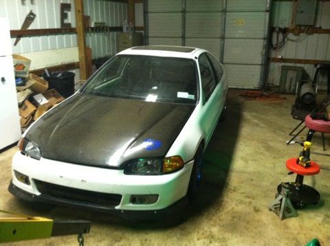 Almost ready for spring (hood was not closed and the bumper wasnt bolted on, so thats why they look crooked)