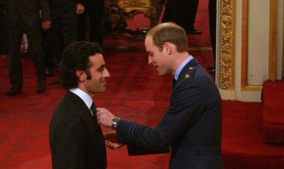 Dario getting the MBE  for contributions to motorsports..........