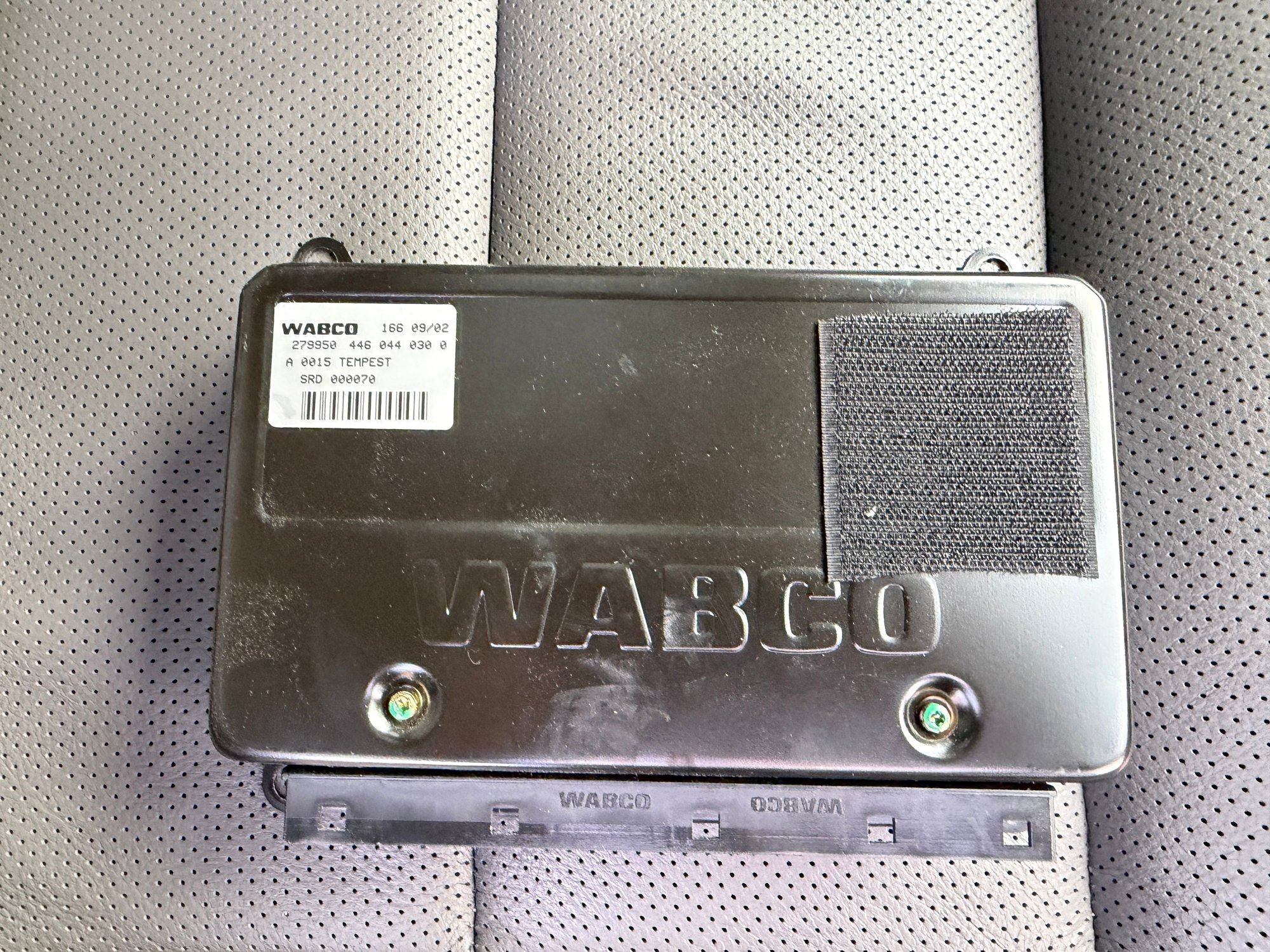SRD000070 - came with the car although not original to the car.  I wonder what the velcro is for? 