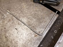 Made a tool that would fit inside door to manipulate the latch