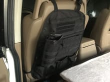 Seatback molle panel. $20 on amazon and extremely useful, I will definitely pick one up for the other side. 