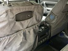 Rear view of front seats - large rear map pocket with button closure