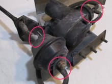 The 3 circles here show where the linkage hooks up, where the vacuum line hooks to the rear of the actuator and where it hooks to the vacuum pump.