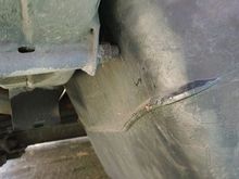 Step 14a Using Helper or a handy jack gently lower the tank from the left