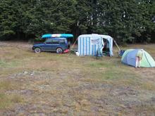 Discovery and Caravan two tents and seven people for a few days canping.