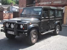 My 2005 Defender Td5 110 CSW, 60K and NO problems  in 8 years.
A 9-seater and one of the last to be built with inward-facing rear seats, before they were banned. Has the 5-cylinder Td5 engine, which replaced the earlier 200- and 300Tdi engines.
Fuel? 29/30 per gallon; Top speed?  70, but I wouldn't do it again! Do I like it YES.