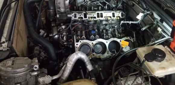 Definitely a blown head gasket that can be seen between cylinders 1 & 3.