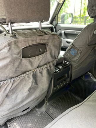 Rear view of front seats - large rear map pocket with button closure