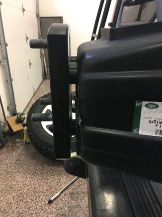 The wheel and tire itself is exceptionally heavy. (32" tire and 18" wheel). Could it be that the spacers provided mount the wheel to far off the back of the truck, putting too much sheering force on the metal carrier?