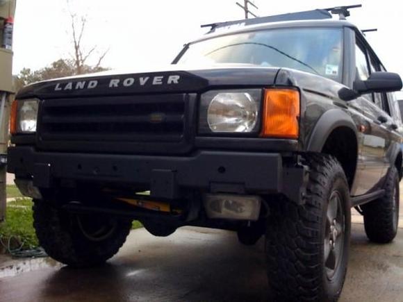 Without the plastic bumper covering and a little flat blck spray paint!