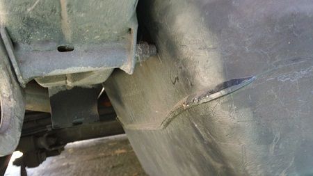 Step 14a Using Helper or a handy jack gently lower the tank from the left
