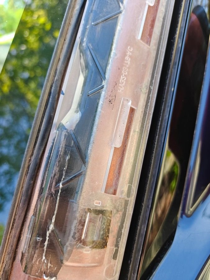 I had to heat up the windshield glue and use a puddy knife to carefully peel off