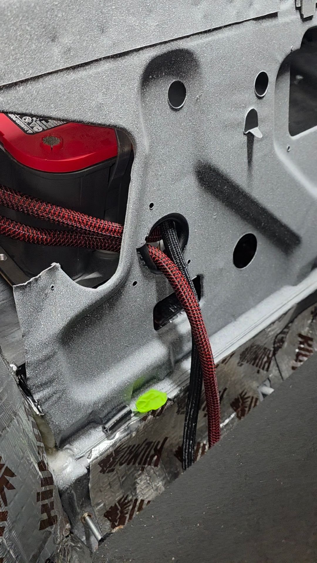 Made a simple but sturdy grommet using fuel line.