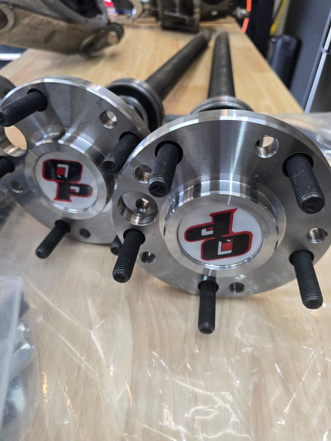 New clean axles. Wheel studs thread my standard gm lugnut so good there. 