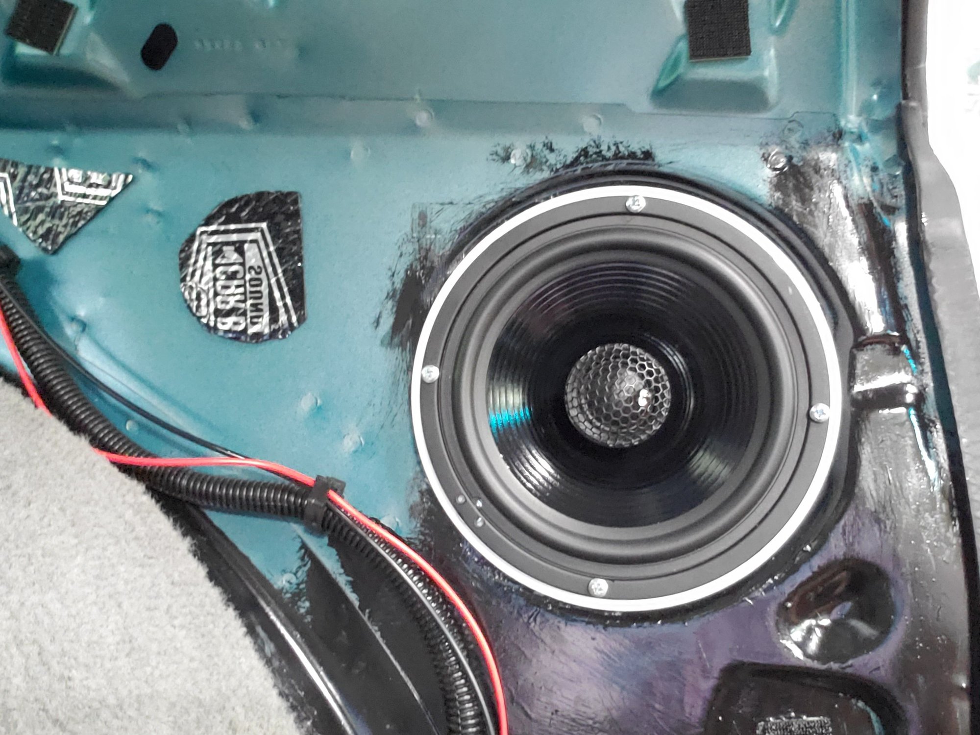 Speaker screwed to spacer