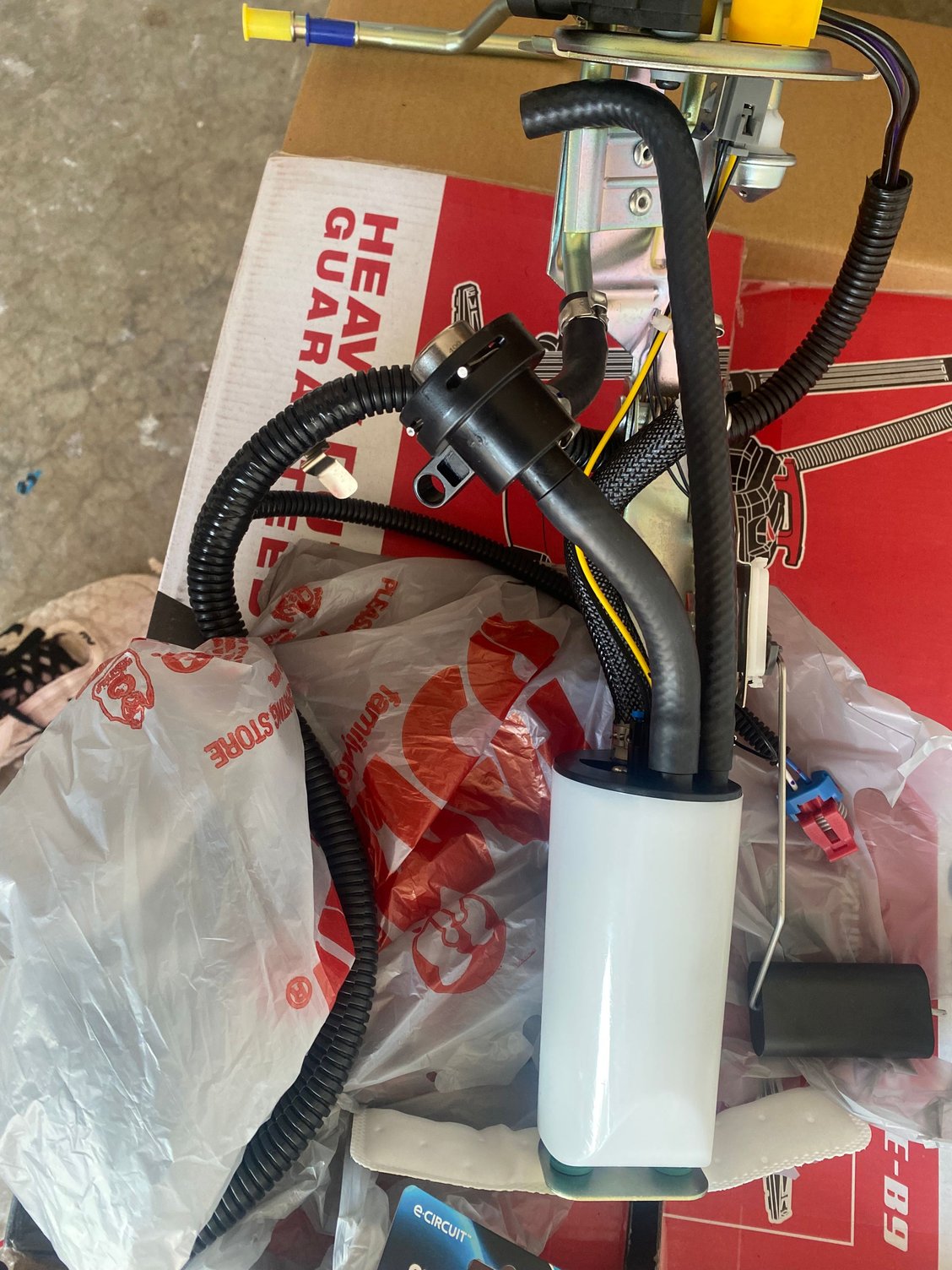 The line that bends to the side. Idk if this is a return line or something else but I do know there is no line in the tank and if there should be.