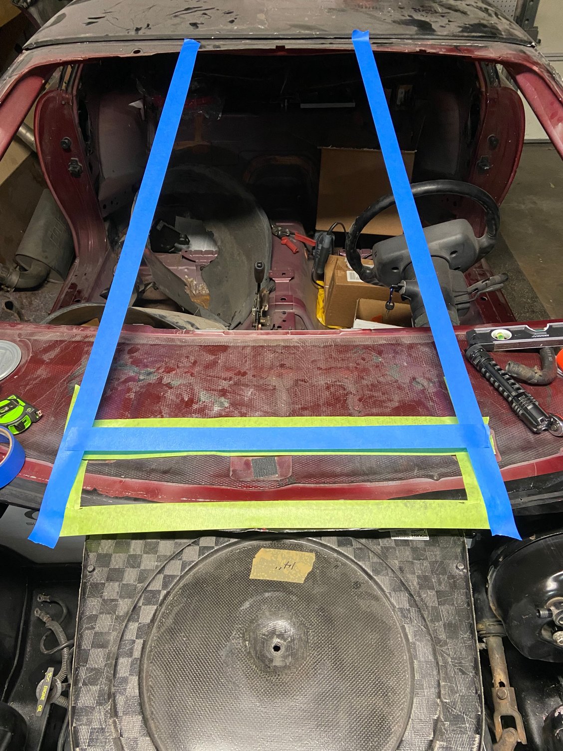 Possible hope to cut for cowl intake. Would need to build upward housing to meet the lexan windshield.
