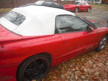 Both ws6 ram air, red w/white vert tops .97formula w/white int auto,            2000 w/black int 6spd trans am.