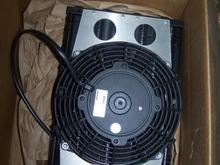 brand spanking new tranny cooler.  with electric fan