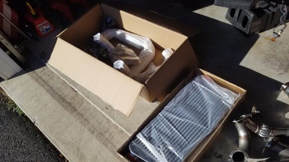 cx racing intercooler kit came in. holy crap is that new intercooler heavy. they didnt skimp on aluminum. 