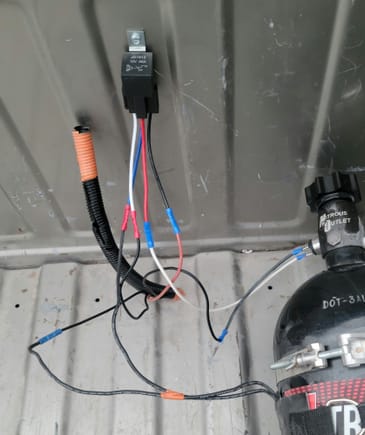 White wire from relay- grounded
Red from relay goes into pressure switch
Blue into warmer
Black from relay 12v to battery
Black wire on pressure switch 12v arming switch
