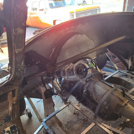 Once the dash bar was bolted in solid and the firewall plug welded from the inside the brace could be removed, I also got the steering and brakes bolted on.  Still need to brace the brake setup better.