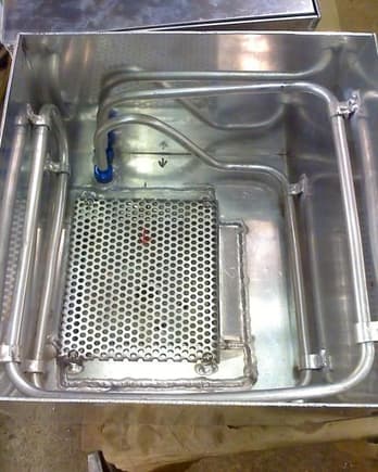 ice cell with trans cooler and screened sump