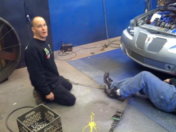 GXP dyno and project......theres Pete Cossilino himself....he is a race car driver and this was his shop...that dyno is rated for NASCAR and BUSH as well as Cart circuit...when they used to do that a lot more than now...he was the guy..