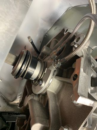 You can see the .180" thick shim between the slave cylinder and the transmission.