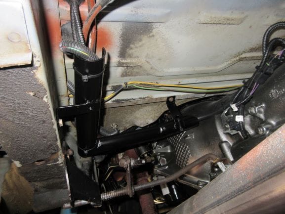 Wire holder under Chevy G30 Van 4L80e trans swap  Made from 1 1/4" conduit.
