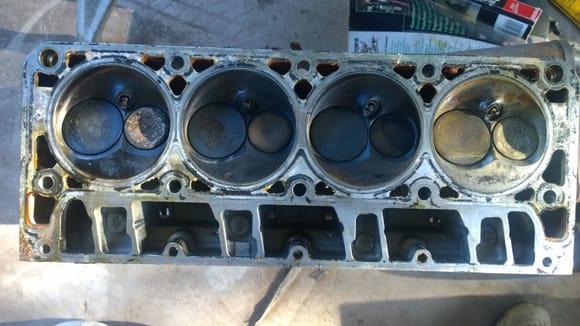 Cylinder head after Free Spun on a dyno.. Cylinder 2, a steam cylinder,  4 & 6 also show water damage.  