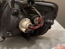 The stock side lamp wire harness you would have to pull from a yard if you don’t want to cut into your existing side lamp harness. The smaller bulb is the city light.