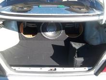 redoing the trunk i got rid of the factory stuff and im makin my own out of wood and fabric so far its pretty good