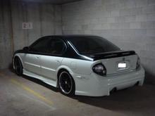 side shot with new taillights Wasn't sure if i liked them or not until i looked at it from the side let me know what you think.