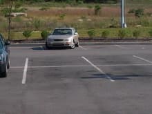 car out in the parking lot at work. always park it crooked in the parking spot