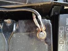 Use a 0-8 gauge ground wire. One end connects at negative battery terminal.