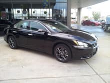 Love at first sight. July 17th 2012 @ the dealership
Limited Edition with leather seats. Black on black.