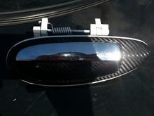 4th Gen Maxima black carbon fiber vinyl wrapped door handle with white spray painted edges