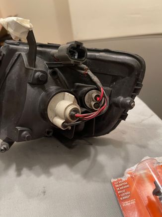 The stock side lamp wire harness you would have to pull from a yard if you don’t want to cut into your existing side lamp harness. The smaller bulb is the city light.